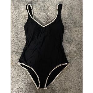 Black and white one piece bathing suit.